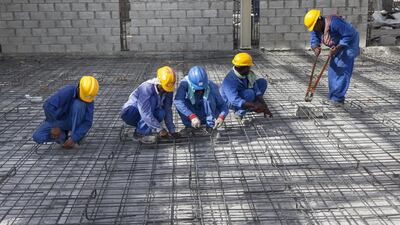 Providing training to labourers before they arrive in the UAE will help make them more efficient workers and also improve their employment prospects when they return home. Photo: Antonie Robertson / The National
