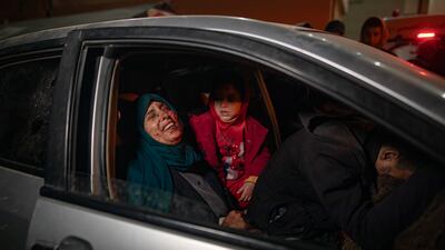 A wounded woman on her way to Kuwait Hospital in Rafah following Israeli air strikes on the city. EPA