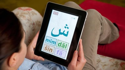Student learning Arabic language. Alamy