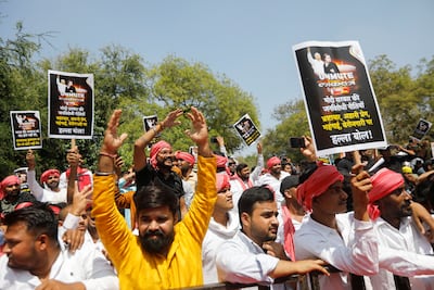 Supporters of India's main opposition Congress party protest in Delhi on Monday after leader Rahul Gandhi was disqualified as an MP. Reuters