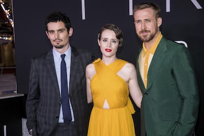 Director Damien Chazelle, left, with Claire Foy and Ryan Gosling. AP