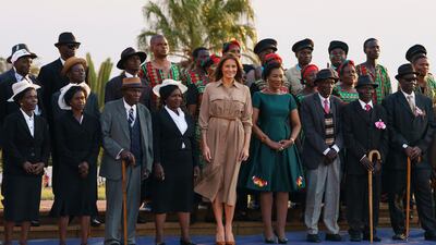 Melania Trump, Malawi first lady Gertrude Maseko and performers gather for photographs after a ceremony at the State House, in Lilongwe, Malawi. Carolyn Kaster / AP Photo