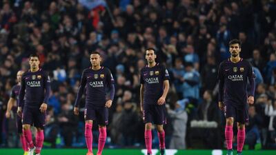 Luis Suarez of Barcelona, Neymar Sergio Busquets, and Andre Gomes after Kevin De Bruyne’s goal. Laurence Griffiths / Getty Images