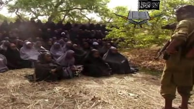 A screengrab of a video released by Nigerian Islamist extremist group Boko Haram on May 12, 2014 showing some of the kidnapped schoolgirls in Nigeria who are still missing. One mother has confirmed that her daughter was seen in the video. AFP Photo
