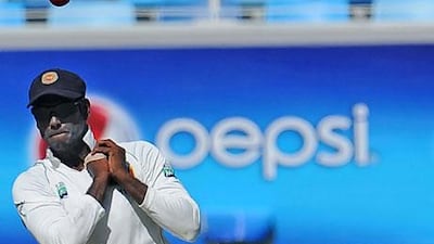 Sri Lanka’s Angelo Mathews drops a catch off Pakistan’s Saeed Ajmal in Dubai on Friday.