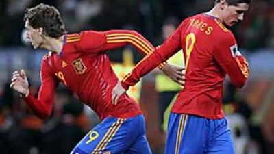 Fernando Torres, right, is substituted for Fernando Llorente during the round of 16 game against Portugal in Cape Town. The coach said he was tired.