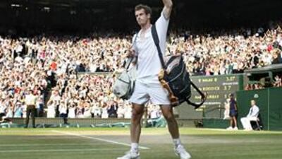 Beaten semi-finalist Andy Murray salutes the Centre Court crowd after losing to Andy Roddick.