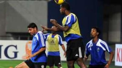 The UAE players train at the Seoul World Cup stadium yesterday the eve of this afternoon's crucial World Cup qualifying match against South Korea. Defeat will see them almost certainly heading for the exit door.