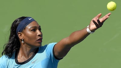 Serena Williams serves to Victoria Azarenka during the Indian Wells WTA final on Sunday in California. Mark J Terrill / AP / March 20, 2016