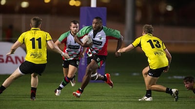 Abu Dhabi Harlequins, white, play Xodus Wasps Dubai, yellow, during their Nissan Rugby League Cup match at Zayed Sports City in Abu Dhabi on April 24, 2015. Christopher Pike / The National
