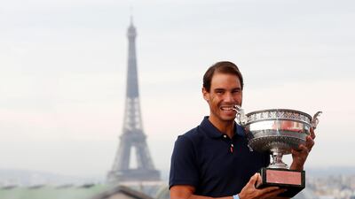 Rafael Nadal poses with the French Open trophy on the Galeries Lafayette Rooftop, Paris. Reuters