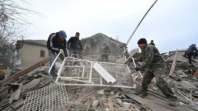 Rescuers at the site of a maternity ward at a hospital destroyed by a Russian missile attack in Vilniansk, Zaporizhzhia region, Ukraine. Reuters