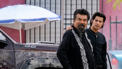 George Lopez as Uncle Rudy and Xolo Mariduena as Jamie Reyes