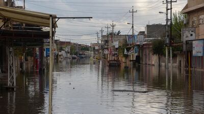 A street is flooded by heavy rain in the northern Iraqi city of Mosul. AFP