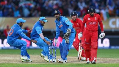 MS Dhoni inspired India to a come-from-behind victory against England in the ICC Champions Trophy final. Michael Steele / Getty Images