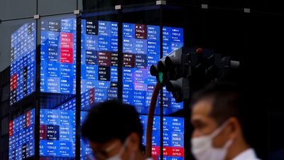 An electronic screen shows Japan's Nikkei share price index. The yen slumped to a 24-year low of nearly 146 to the dollar. Reuters