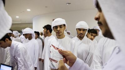 First-year students register for orientation at Zayed University in Khalifa City, Abu Dhabi, on Tuesday. Christopher Pike / The National