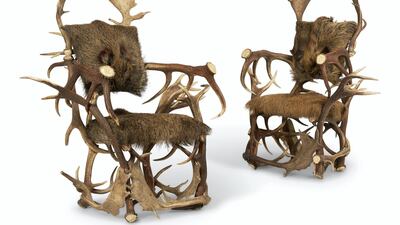 Lot 263: pair of antler throne chairs. Photo: Dreweatts