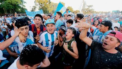 Argentina fans await the arrival of the football team in Ezeiza, Buenos Aires. AFP