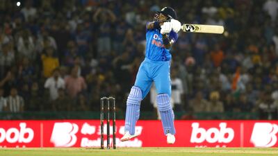 Hardik Pandya hits a boundary in Mohali. Getty