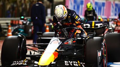 BAHRAIN, BAHRAIN - MARCH 19: Second place qualifier Max Verstappen of the Netherlands and Oracle Red Bull Racing climbs from his car in parc ferme during qualifying ahead of the F1 Grand Prix of Bahrain at Bahrain International Circuit on March 19, 2022 in Bahrain, Bahrain. (Photo by Mark Thompson / Getty Images)