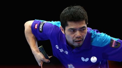 Chuang Chih-yuan of Chinese Taipei in action against Gao Ning of Singapore during Day 1 of the 2016 Table Tennis Asian Cup at Dubai World Trade Centre on April 28, 2016 in Dubai. (Photo by Warren Little/Getty Images)