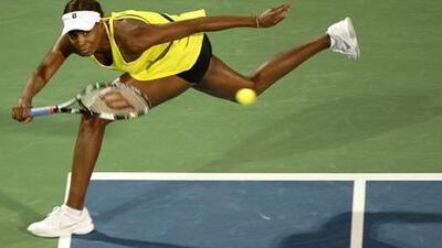 Venus Williams returns the ball to Victoria Azarenka during last night's final of the WTA Dubai Tennis Championships at the Aviation Club. The No 3 seed won in straight sets to lift the trophy.