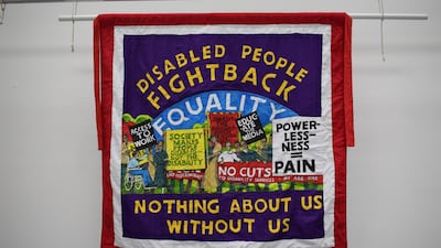 This Disabled People Fight Back banner from 2014 is on display at the exhibition in London. Photo: People’s History Museum