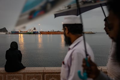 A bulk carrier sits anchored as families gather on the last day of Eid at Sultan Qaboos Port on March 23, 2026 in Muscat, Oman. Getty Images