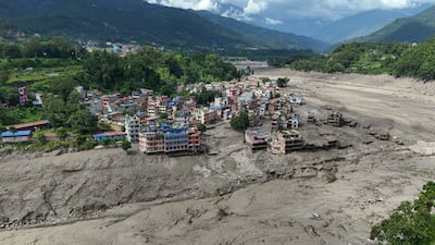 An aerial view of damaged homes in Trishuli Bazar after flash flooding in Nuwakot district, Nepal. Several people were killed, with many others still unaccounted for. EPA