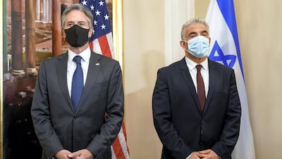 US Secretary of State Antony Blinken and Israeli Foreign Minister Yair Lapid pose for a picture as they meet in Rome,. Reuters
