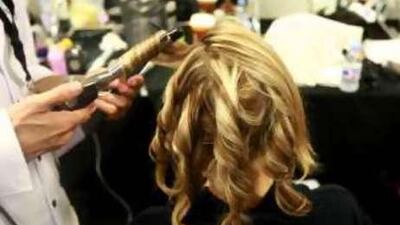 Hair 'em: The scene backstage at Dubai Fashion Week.