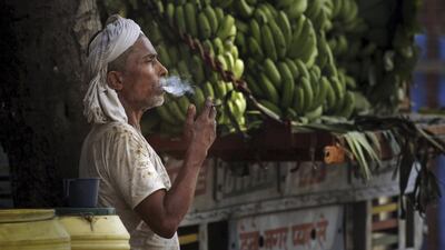 Most of the tobacco consumed in India is either hand-rolled, such as bidis, or illegally imported cigarettes, which means that it is not taxed. Rajesh Kumar Singh / AP Photo