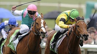 Special Duty, left, Jacqueline Quest vie for the 1,000 Guineas at Newmarket. Jacqueline Quest crossed the finish line first.