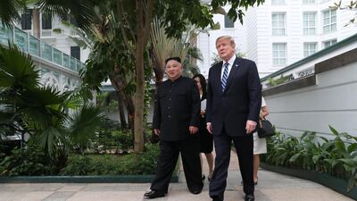 Kim Jong Un and Donald Trump talk in the garden of the Metropole hotel. Reuters