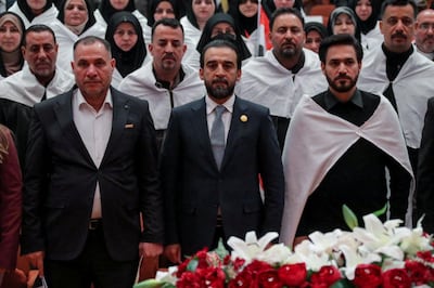 Mohammed Al Halbousi attends parliament in Baghdad on Sunday. Reuters