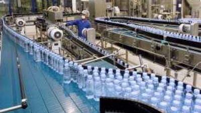 Bottles make their way through the Masafi plant. Average annual consumption of bottled water in the UAE is 285 litres a person.