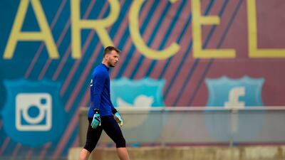 Barcelona's Brazilian goalkeeper Neto waks towards a goal for shooting practice. AFP
