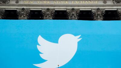 A Twitter sign on the facade of the New York Stock Exchange. Twitter profit beat expectations. AP