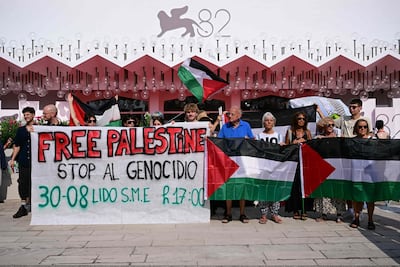 Venice4Palestine protesters display their banner before the film's festival's opening ceremony. AFP