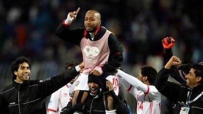 Ismail Matar, who is now the only UAE player to lift two Gulf Cups, celebrates with his teammates after their victory against Kuwait in this year's semi-final. Mohammed Dabbous / Reuters