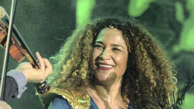 Ghalia Benali, here performing in Abu Dhabi, reaches a global audience with Arab song. Khushnum Bhandari for The National