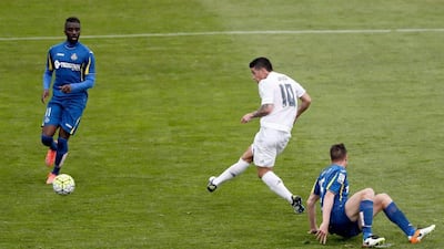 Real Madrid’s Colombian midfielder James Rodriguez (C) scores his goal during their La Liga match against Getafe FC played at Coliseum Alfonso Perez stadium in Getafe, Madrid, Spain on 15 April 2016. EPA/JuanJo Martin