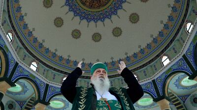 Bektashi leader Baba Mondi prays inside a temple in Tirana. Last year, Albanian Prime Minister Edi Rama announced plans to establish a sovereign Muslim microstate run by the Sufi sect with roughly 100,000 members on the land where the temple stands. It would cover 0.11 square kilometres, making it the smallest country on Earth. AFP