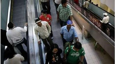 Shoppers at Al Wahda Mall yesterday, which, like other retail outles in the Emirates, expects a jump in visitors and sales this week.