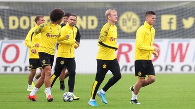 Dortmund players Axel Witsel, Paco Alcacer, Julian Brandt, and Julian Weigl attend their team's training session. AFP