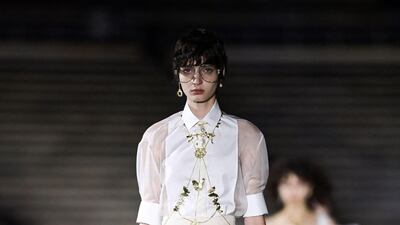 A model walks the runway during the Dior Cruise show 2022 at Panathenaic Stadium on June 17, 2021 in Athens, Greece. AFP