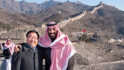 Saudi Crown Prince Mohammad Bin Salman poses for a photo with the Chinese Ambassador to Saudi Arabia at the Great Wall of China. EPA
