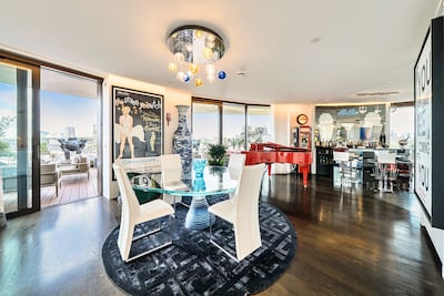 The art and furnishings at Charlie Mullins' penthouse are also for sale, valued at £2 million. Photo: Harris Le Beau