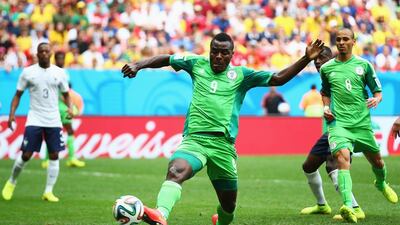 Emmanuel Emenike of Nigeria scores but the goal is disallowed for offside during the round of 16 match against France on Monday at the 2014 World Cup. Paul Gilham / Getty Images